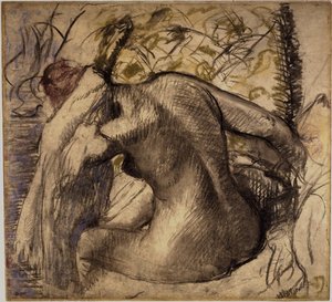 Femme nue assise séchant ses cheveux